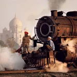 Steam engine passes in front of the Taj Mahal, Agra, Uttar Pradesh, 1983