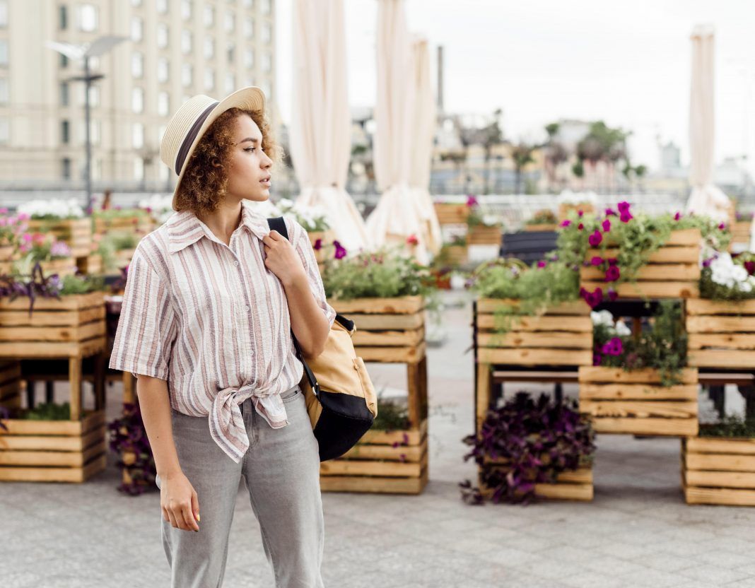 side-view-woman-traveling-new-town